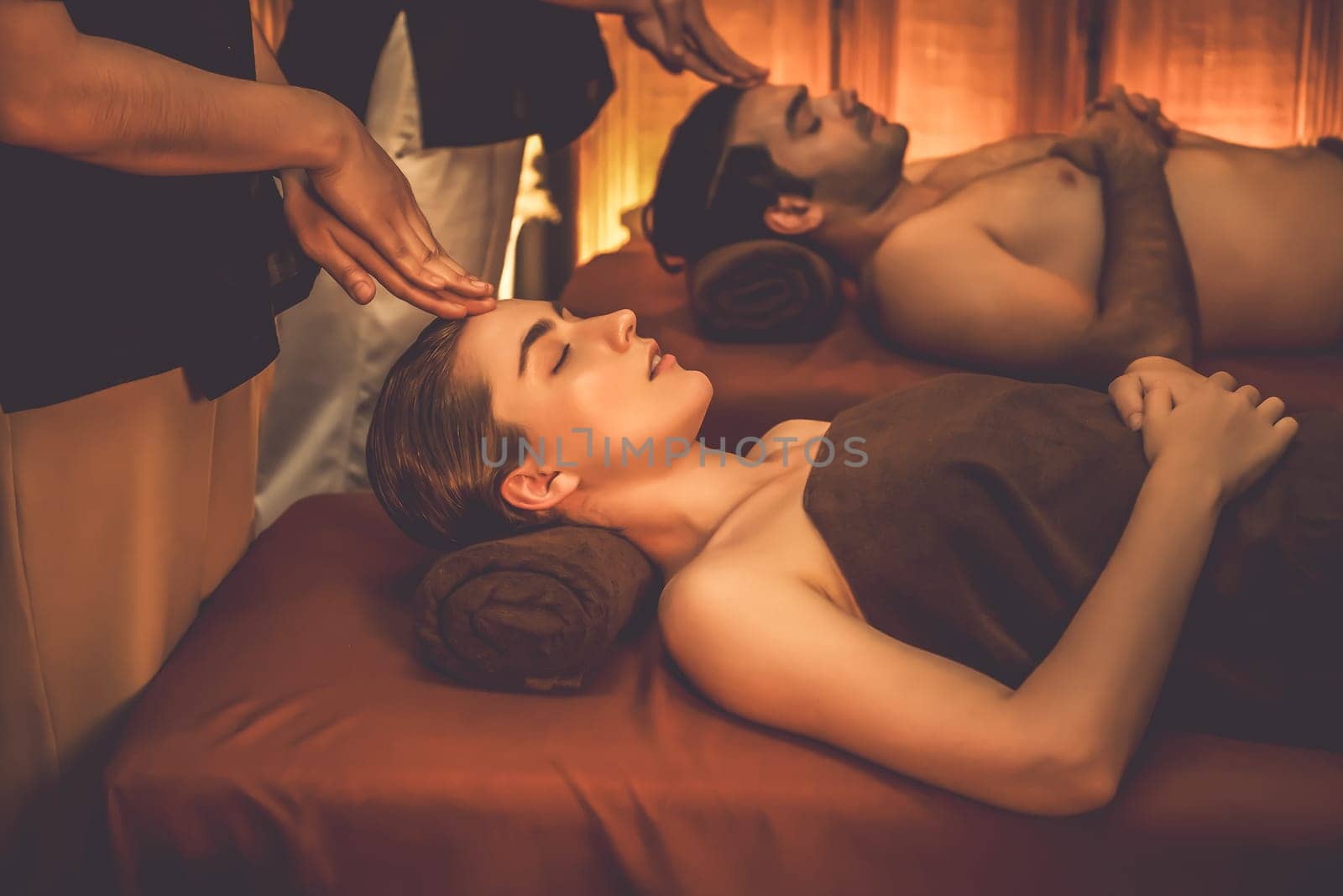 Couple customer enjoying relaxing anti-stress head massage. Quiescent by biancoblue