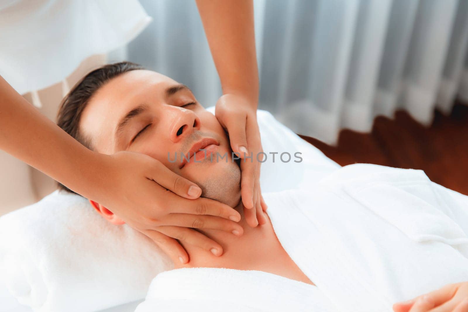 Caucasian man enjoying relaxing anti-stress head massage. Quiescent by biancoblue