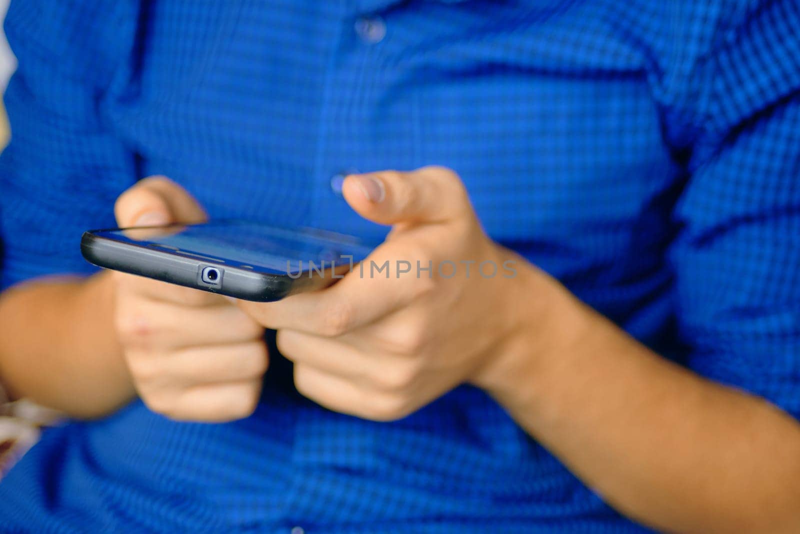 Using Smartphone. Close up of a human using mobile smart phone.