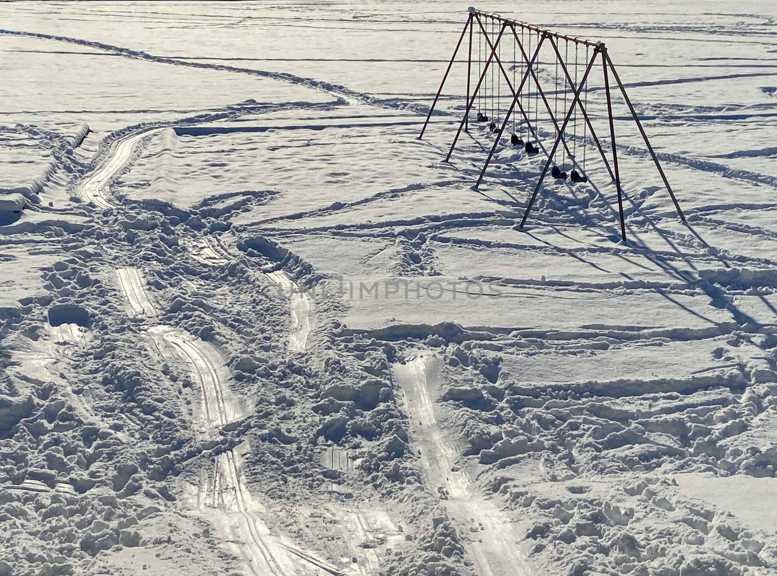 Kids playground in snow on winter season in Canada.