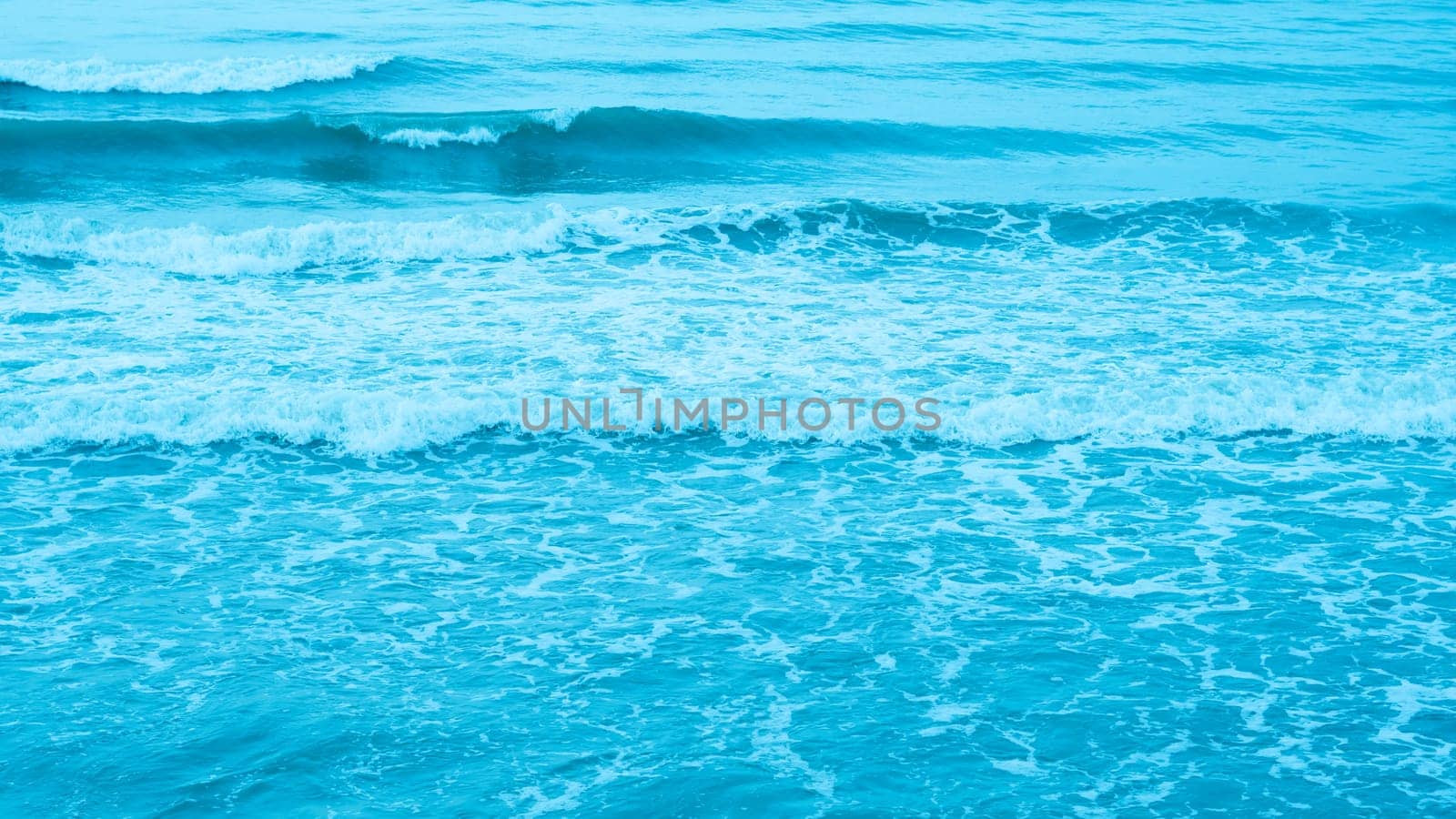 Real photo sea water waves, abstract background, nature power, pale light blue more tone in stock.