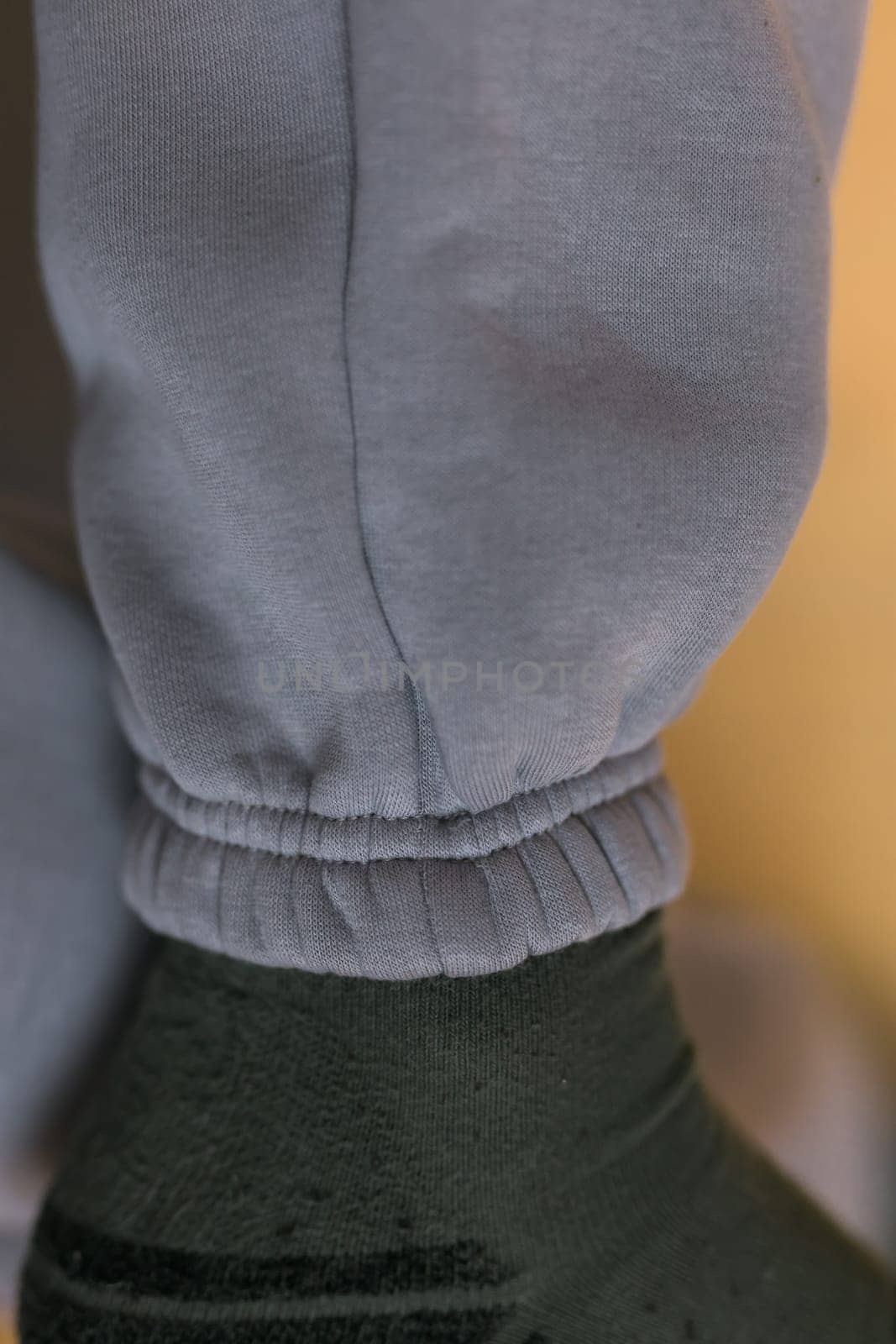 Close-up of cotton sweatshirt fabric texture clothes - design clothes tailoring and youth fashion