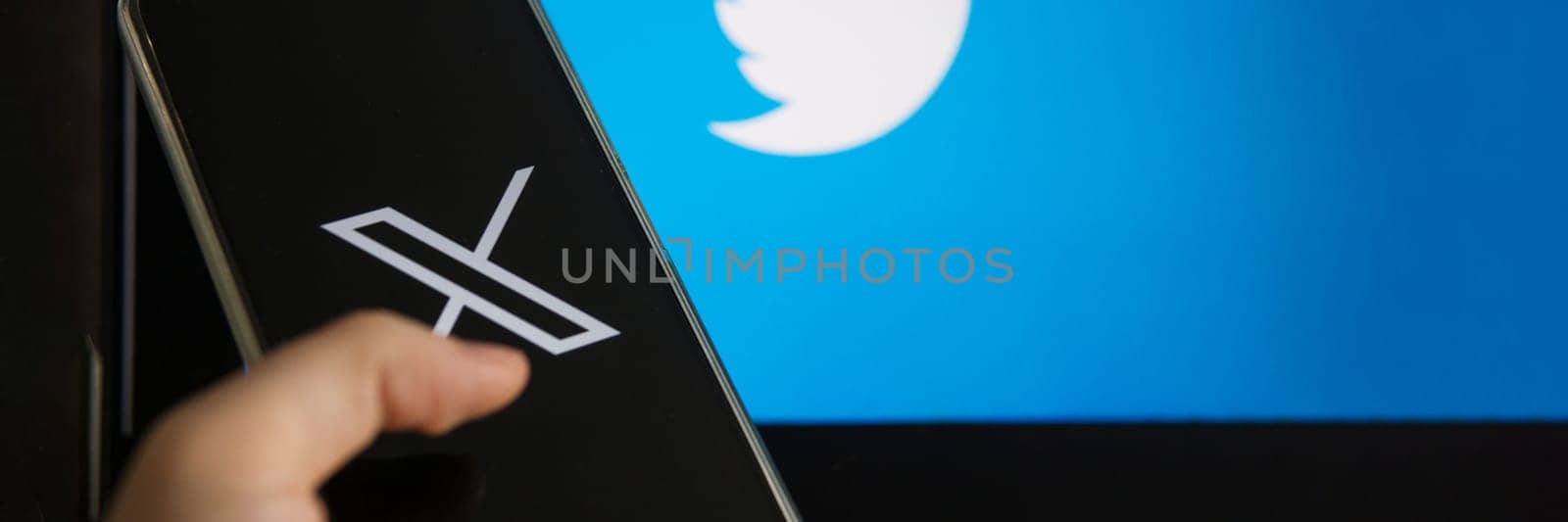 July 25, 2023, Russia. The logo in the form of the letter X displayed on the smartphone. Twitter rebranding, and implementation of X. by Annu1tochka