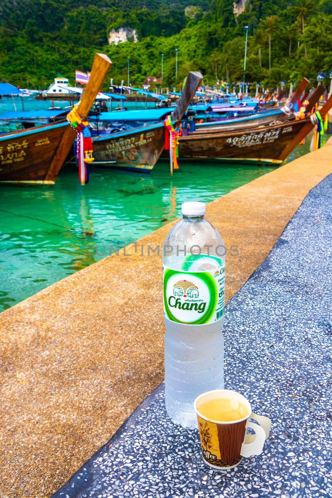 Thai longtail boats chang water and coffee on Koh Phi Phi Don island in Ao Nang Amphoe Mueang Krabi Thailand in Southeast Asia.