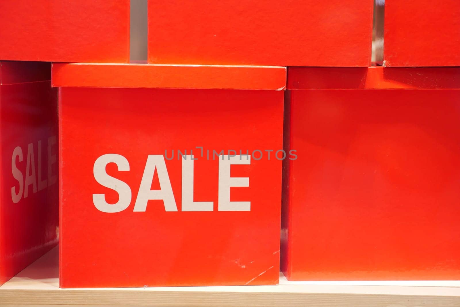 Red boxes marked SALE are used in promotions to attract potential customers effectively