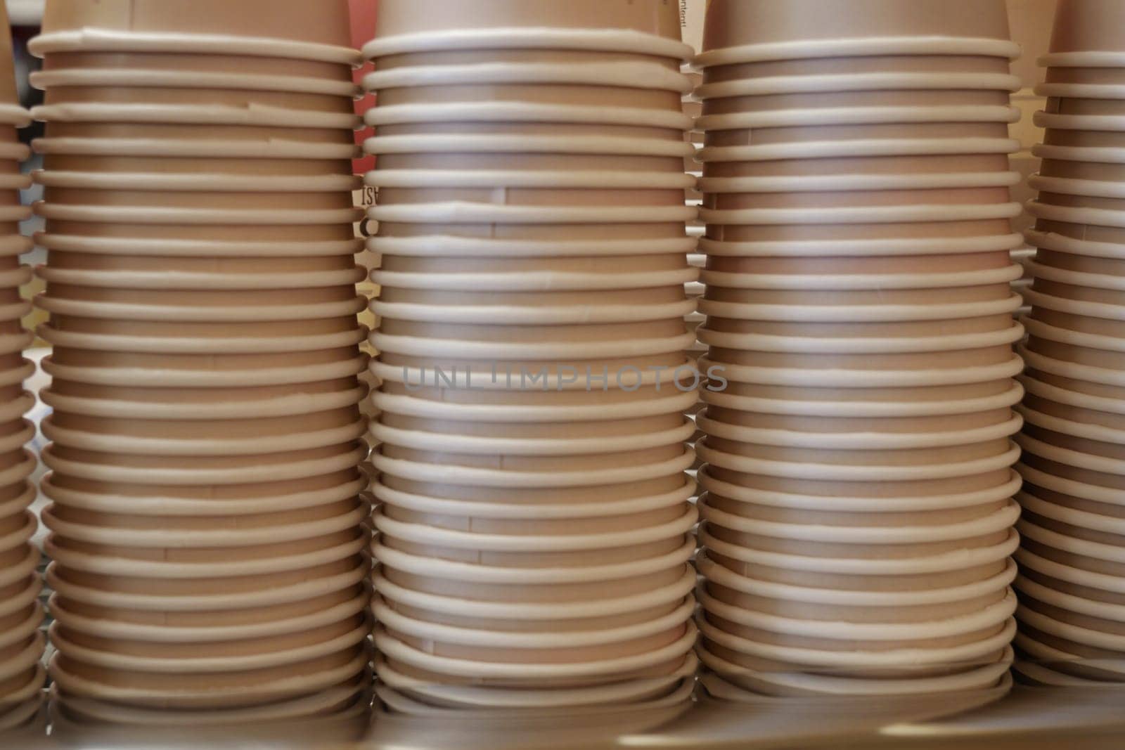 Lots of paper coffee cups at cafe ,