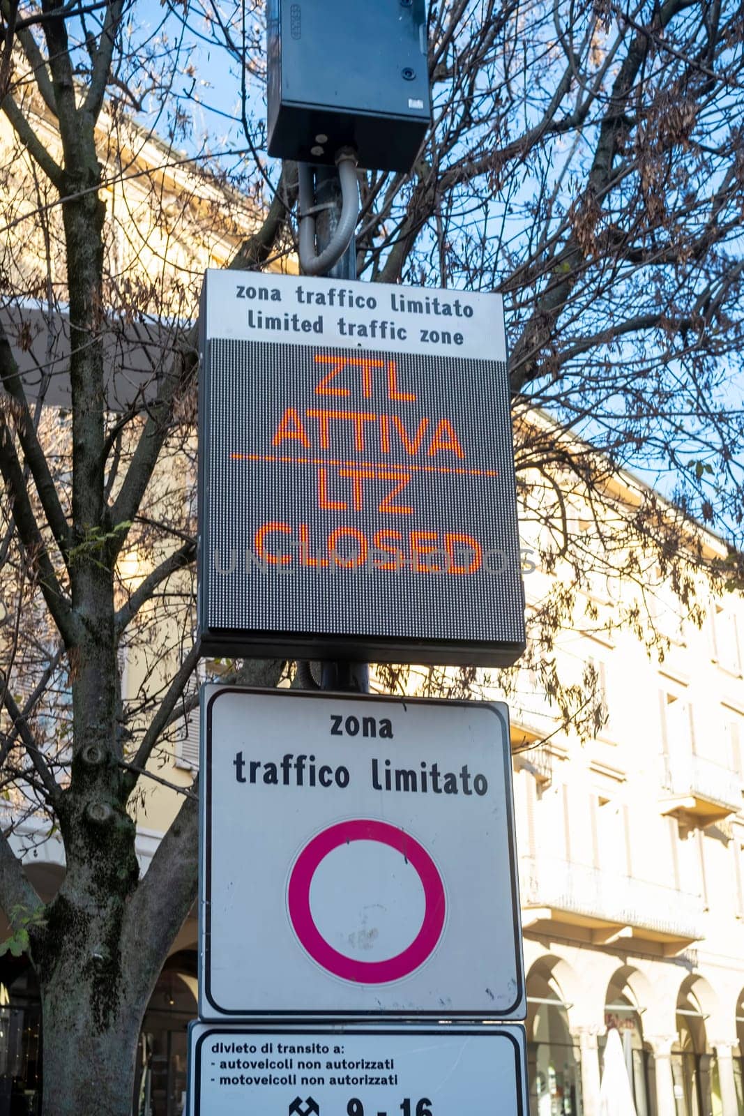 Cremona, Italy - November 27th 2024 Electronic sign displaying ztl attiva (ztl active) and ltz closed indicating an active limited traffic zone in cremona, italy, with supporting signage
