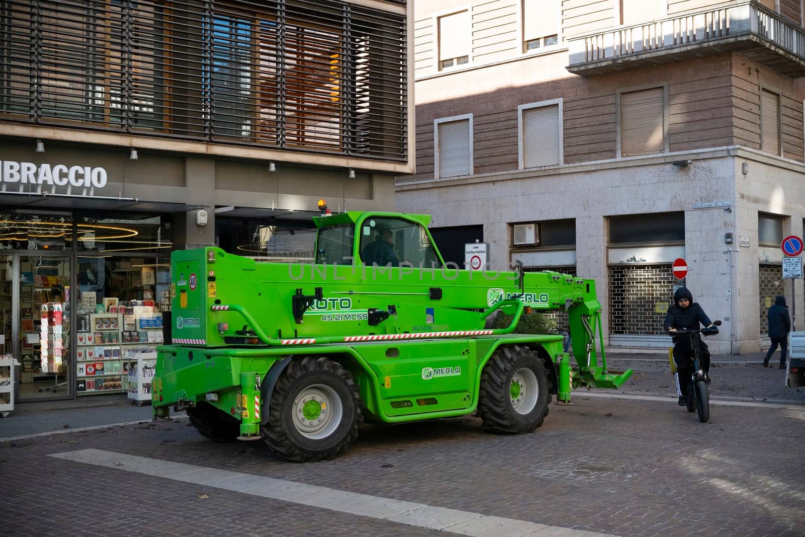 Cremona, Lombardy, Italy - October 27th 2024 Merlo roto 38.16 s plus telehandler, with a kubota v3800-cr-te4 engine, parked on a city street