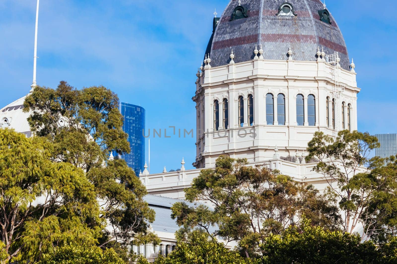 MELBOURNE, AUSTRALIA - AUGUST 1, 2024: Royal Exhibition Building in Carlton Gardens on a clear sunny winter's day in Melbourne Australia