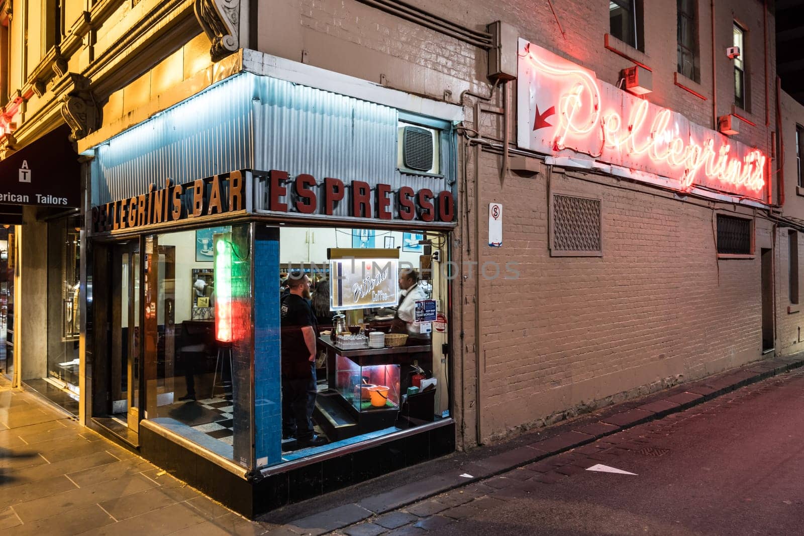 MELBOURNE, AUSTRALIA - OCTOBER 10, 2024: Melbourne's Pellegrini's Espresso Bar at night on October 10th, 2024