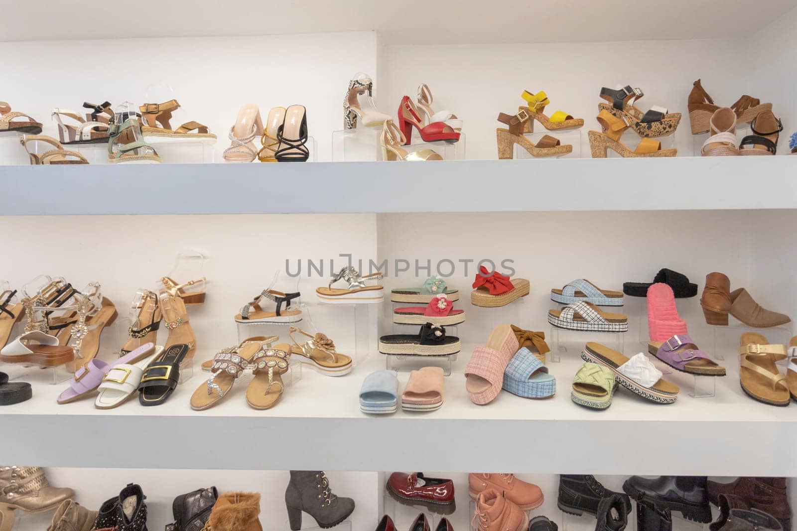 Elegant women's shoes displayed in a shoe shop by mailos