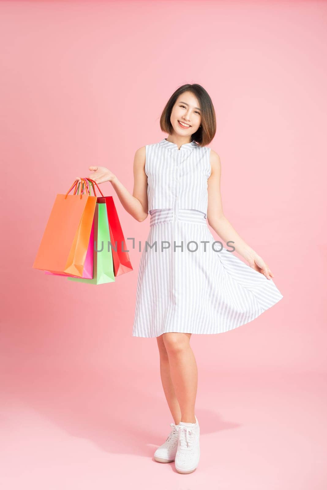 woman in sundress shopping shopaholic by makidotvn