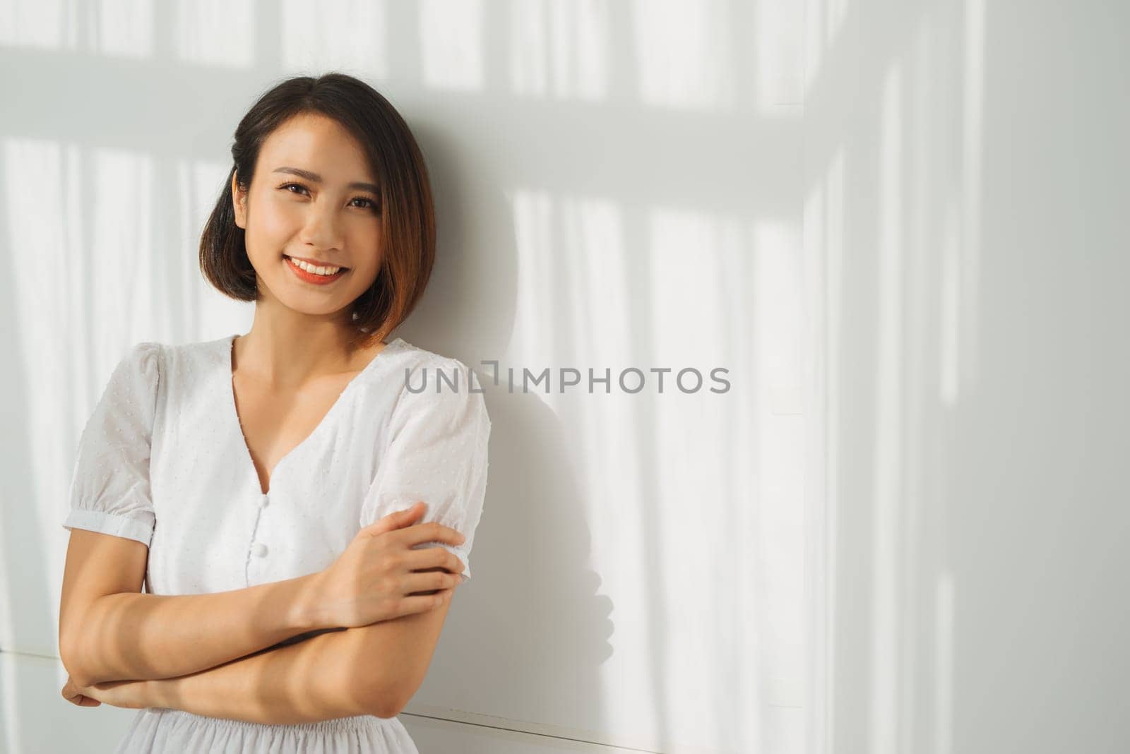 A woman in bright clothes leaned and the falling shadow by makidotvn