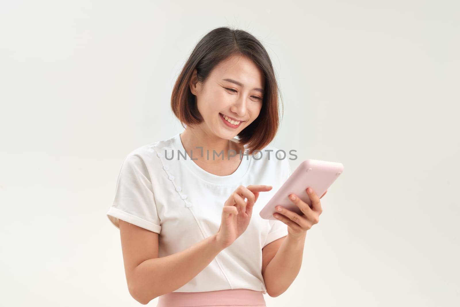 young woman with calculator, isolated on white background