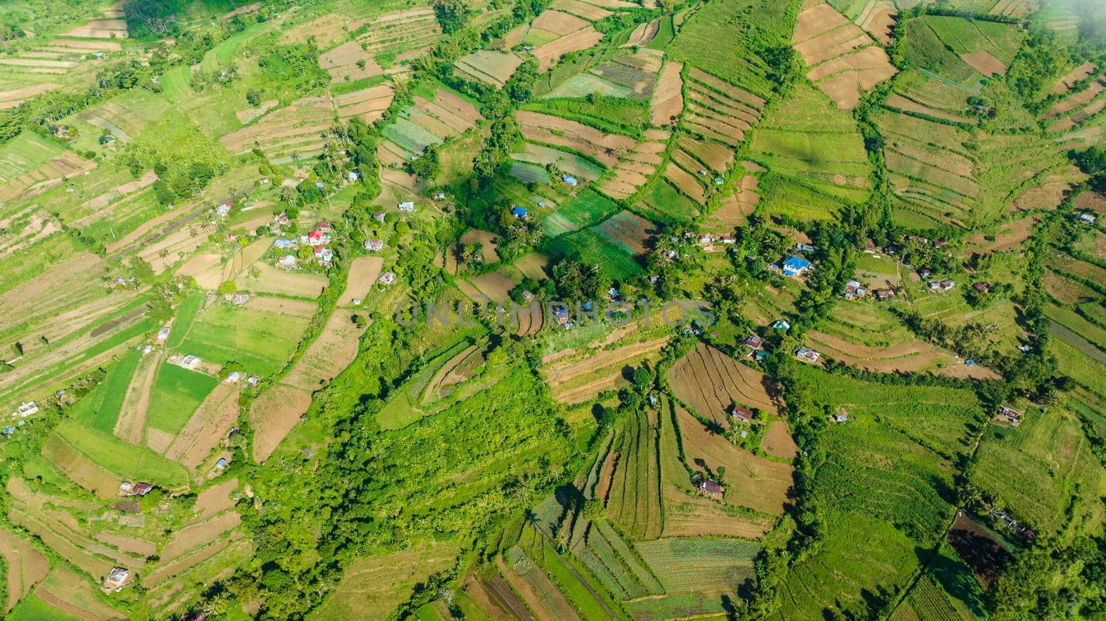 Top view of agriculture and farmland in a mountainous area near the Canlaon volcano. Negros, Philippines
