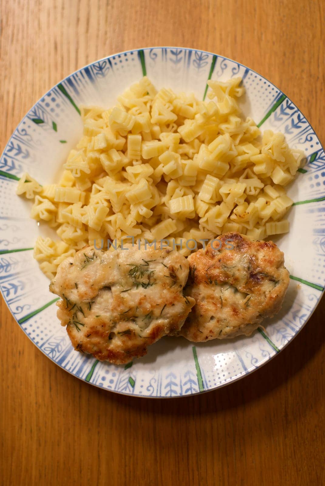 Enjoy our tasty chicken patties paired with a beautifully arranged pasta portion on an elegant plate
