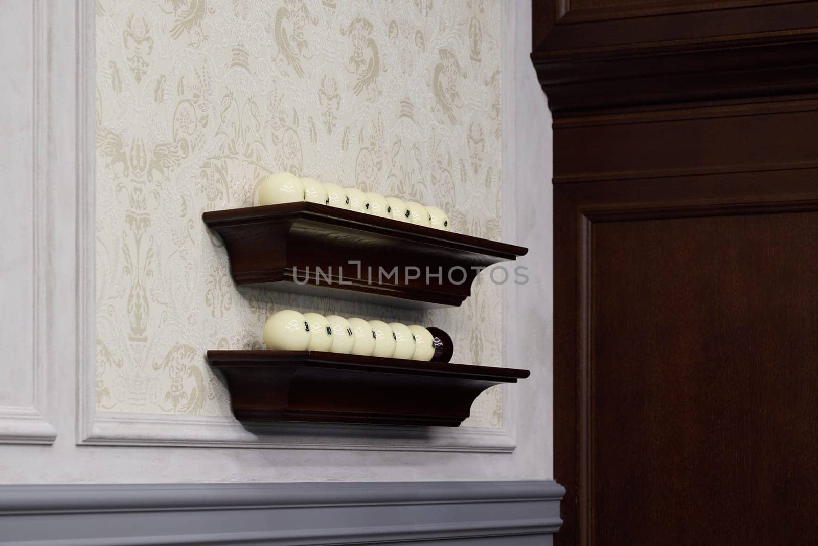 Beautiful decorative display shelves elegantly showcasing a collection of ornamental eggs in a stylish interior