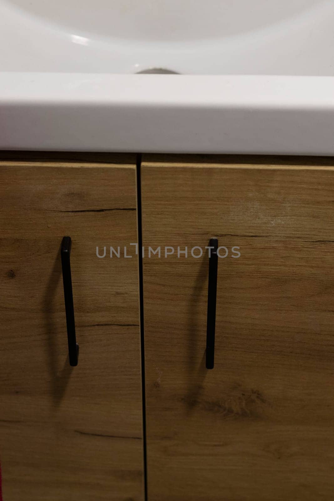 Shot of the cabinet under the sink in the bathroom