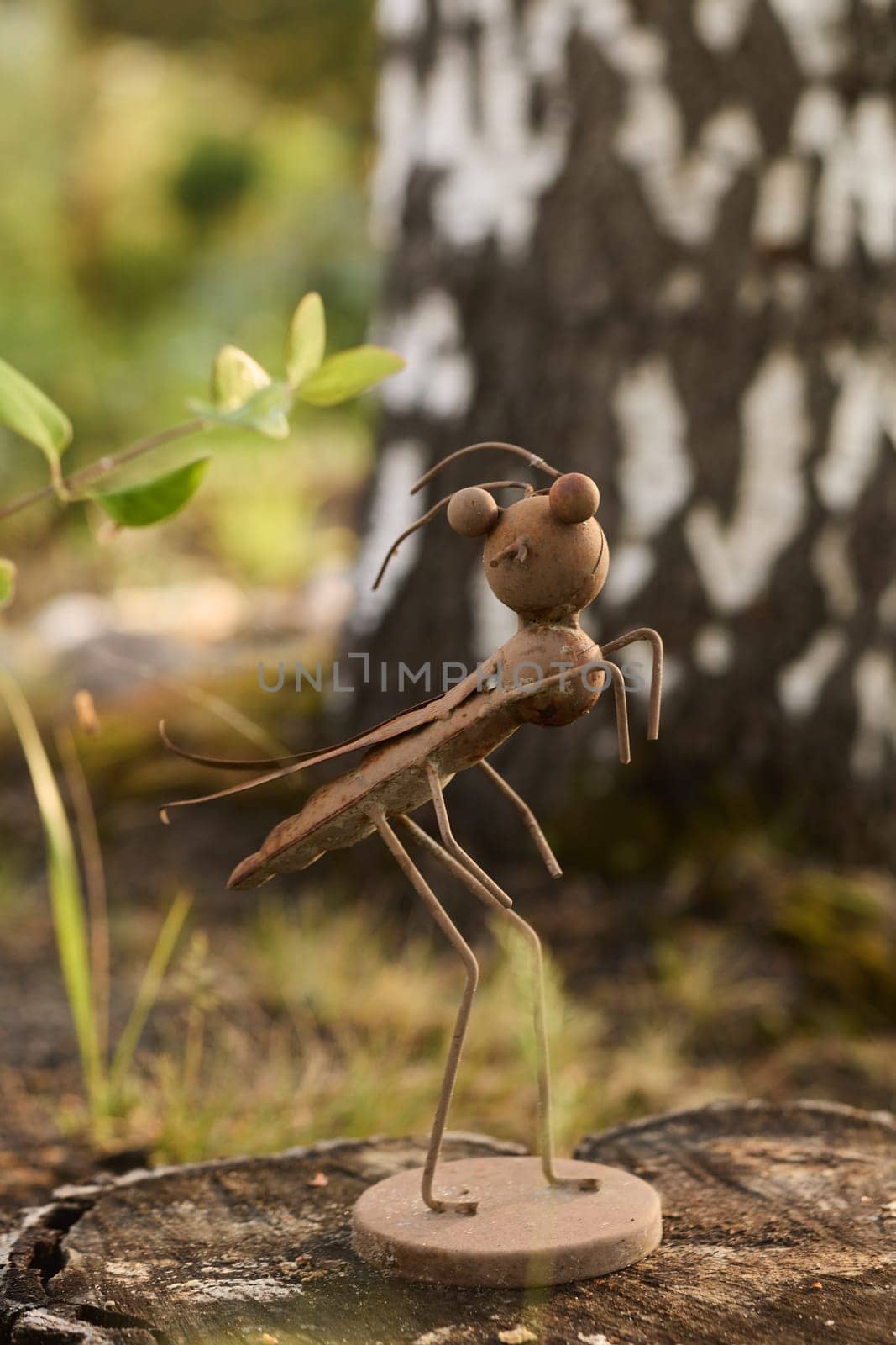 A unique and captivating insect sculpture that beautifully showcases creativity using natural elements from nature
