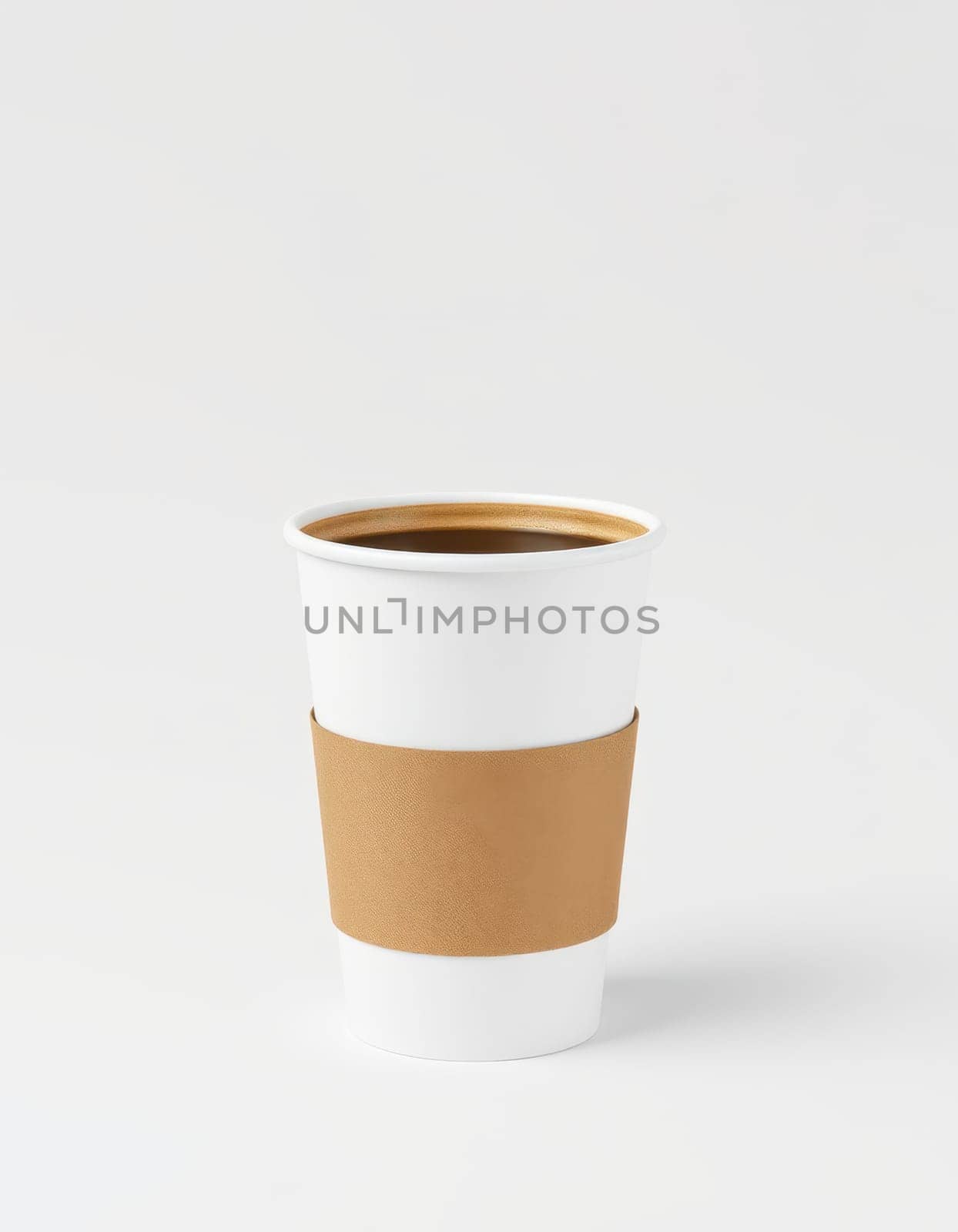 A white coffee cup with a cardboard sleeve is filled with a warm drink. Its simple design emphasizes the rich color of the beverage, set against a neutral backdrop.