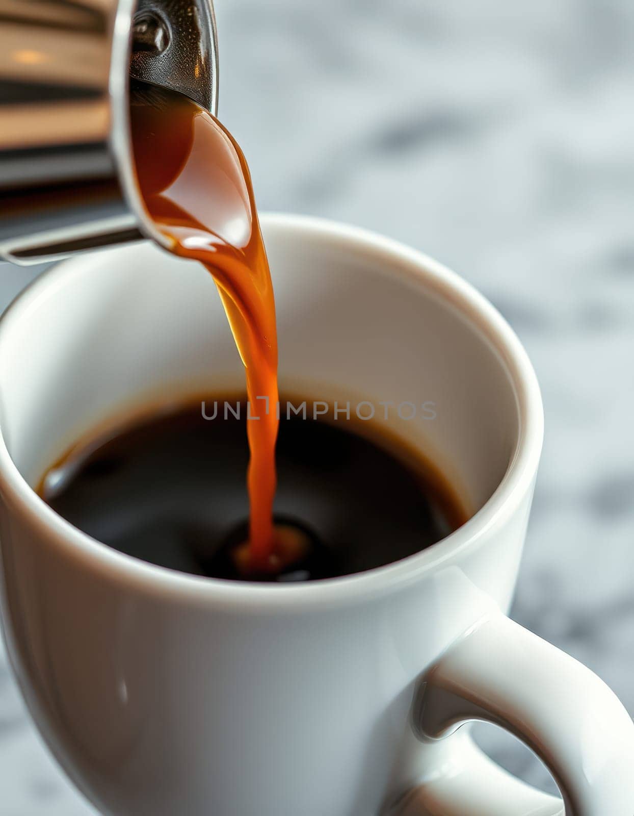 Dark coffee flows smoothly from a stainless steel pot into a white cup resting on a light marble table, highlighting a tranquil cafe atmosphere perfect for relaxation.