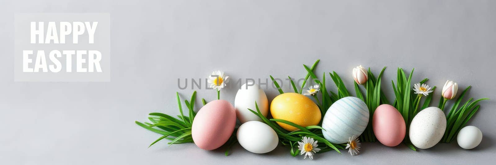 Decorative Easter eggs in various colors are arranged on a light background alongside fresh greenery and daisies, creating a joyful spring ambiance for the holiday celebration.