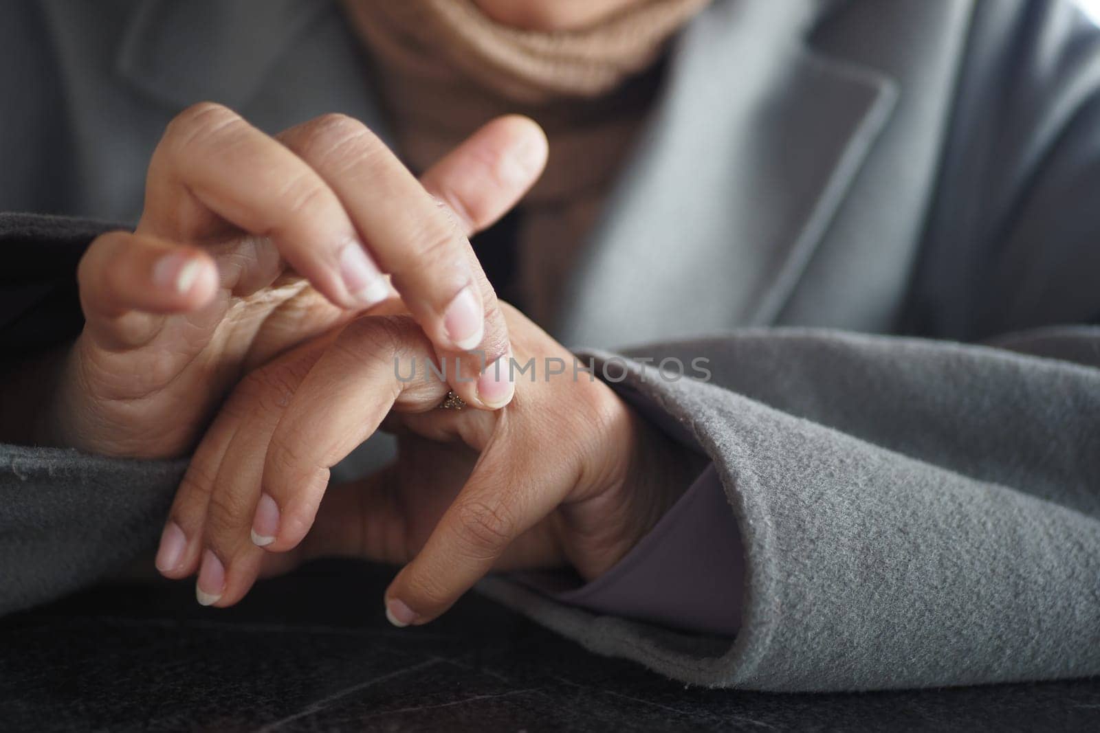 Young women hands suffering wrist pain,