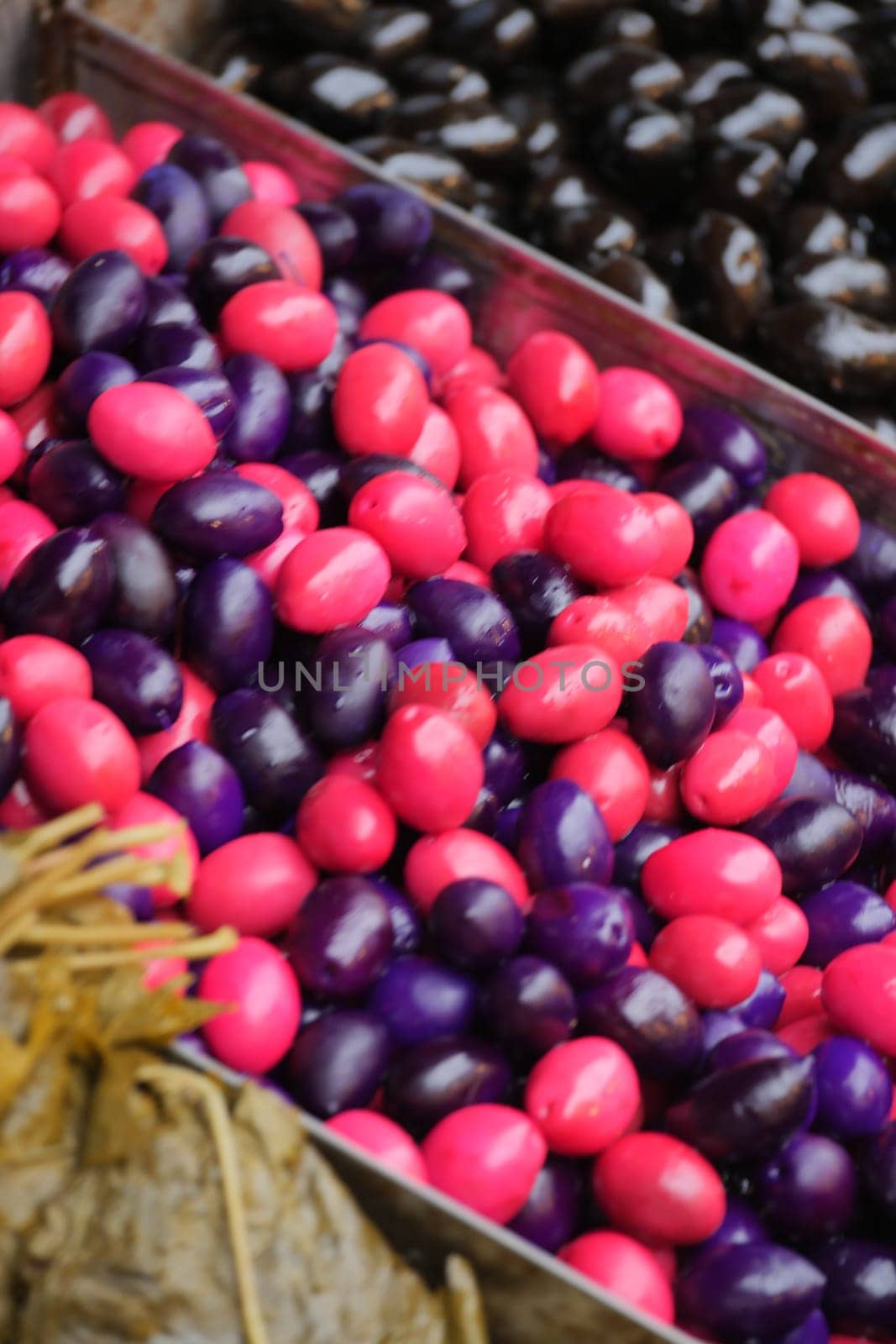 mixed of green. yellow , purple and red color olive ,