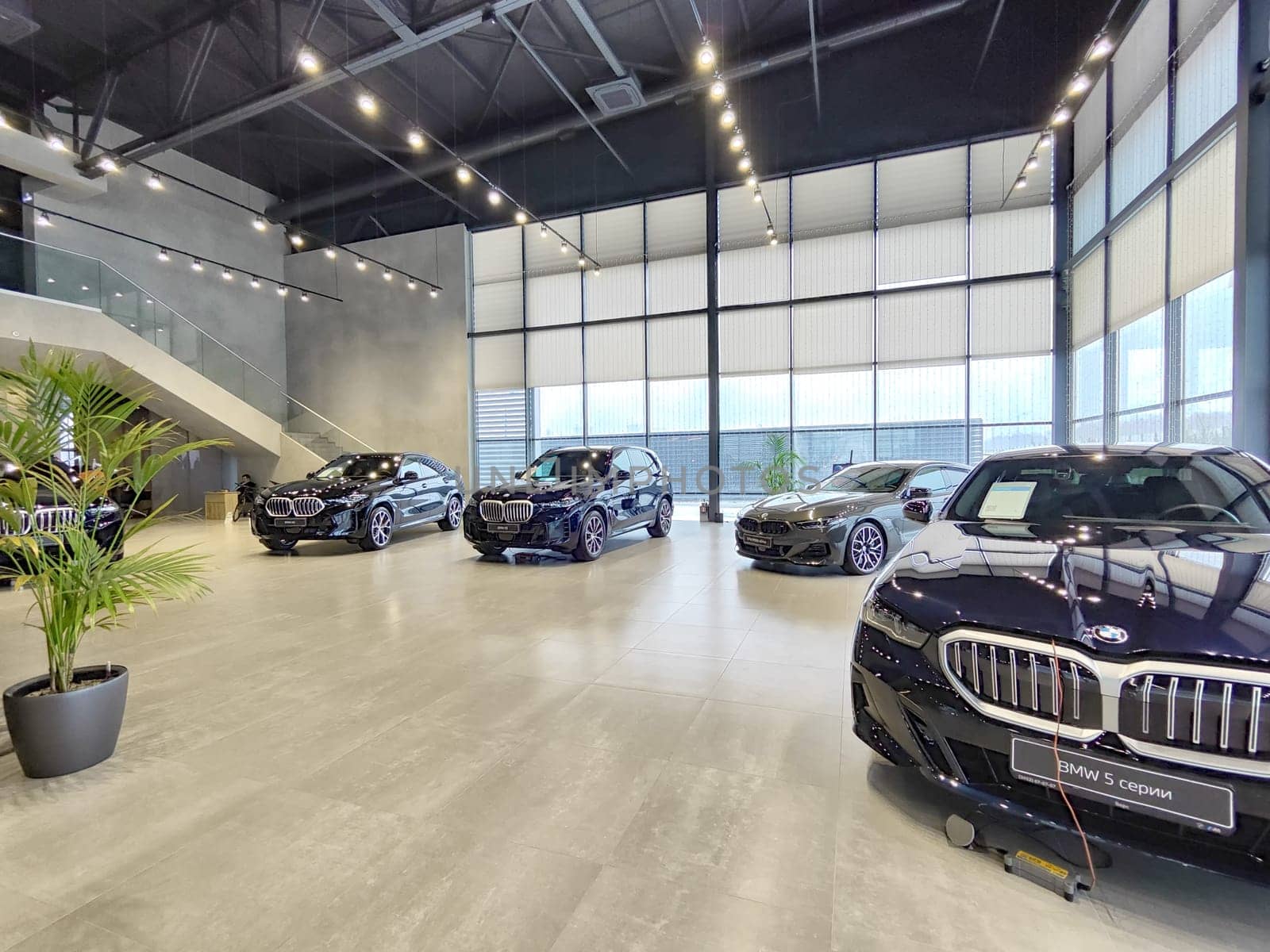 Tumen, Russia - November 09, 2024: Car in nice showroom of dealership BMW