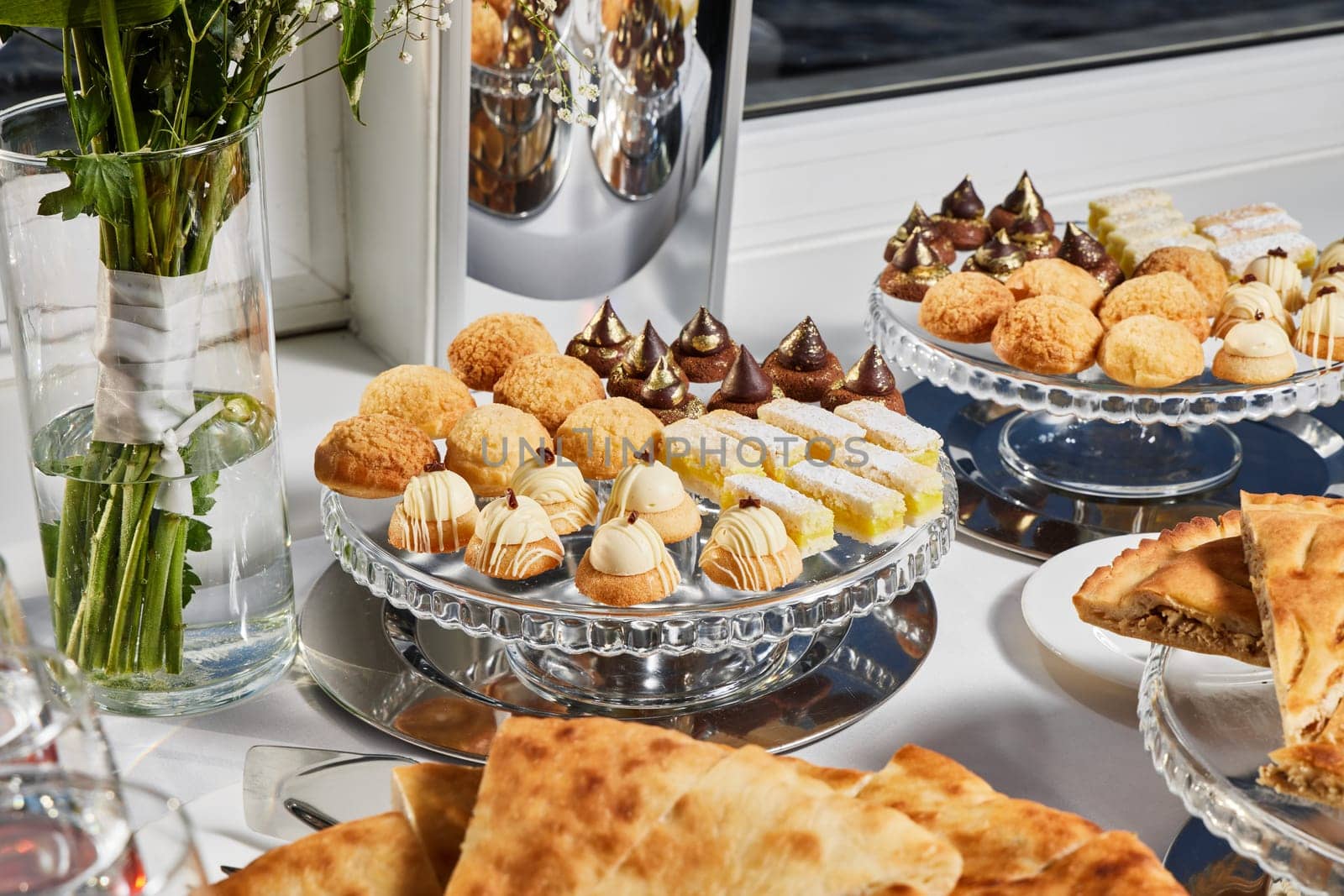 An array of delightful Middle Eastern delicacies and pastries is beautifully arranged for your enjoyment