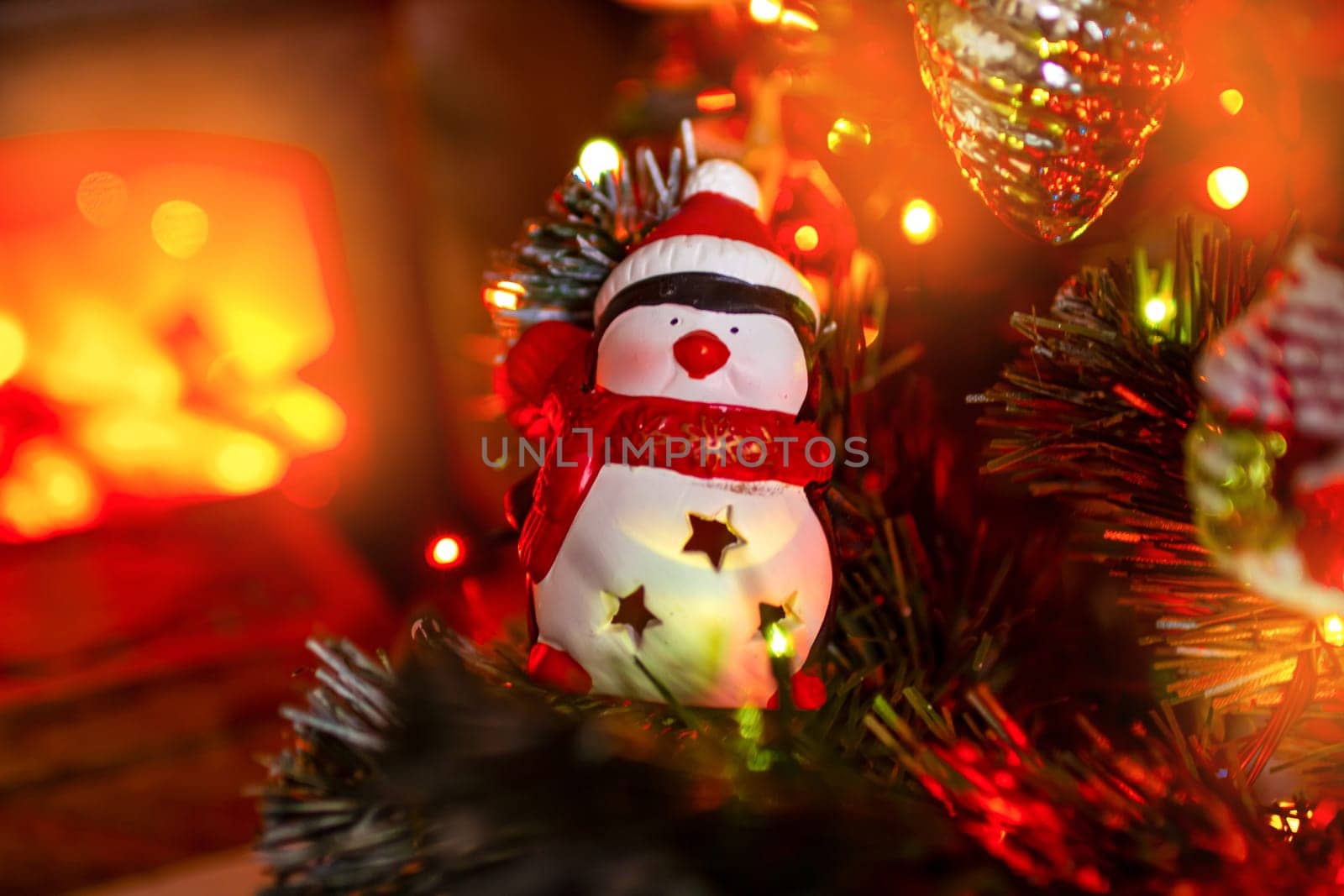Beautiful festive decorations on the Christmas tree. Close-up. Beautiful Christmas background. The concept of decorations and decor for the new year. New Year's Card 2025. High quality photo