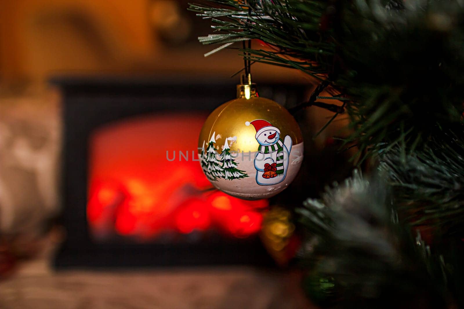 Beautiful festive decorations on the Christmas tree. Close-up. Beautiful Christmas background. The concept of decorations and decor for the new year. New Year's Card 2025. High quality photo