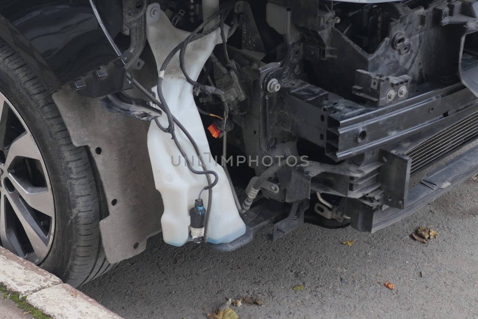 car damaged by a road accident .