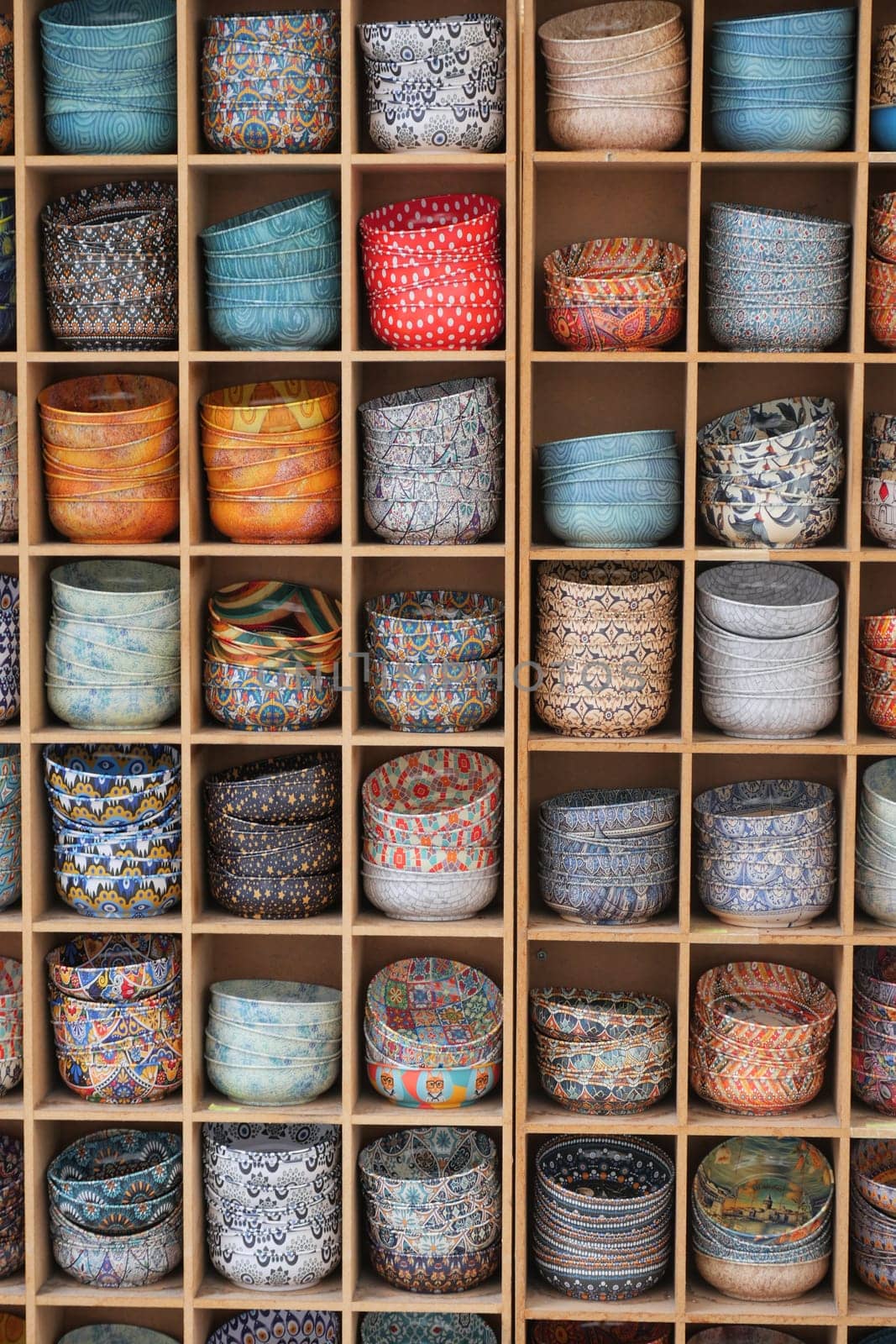 An array of vibrant and decorative storage baskets beautifully and neatly arranged together