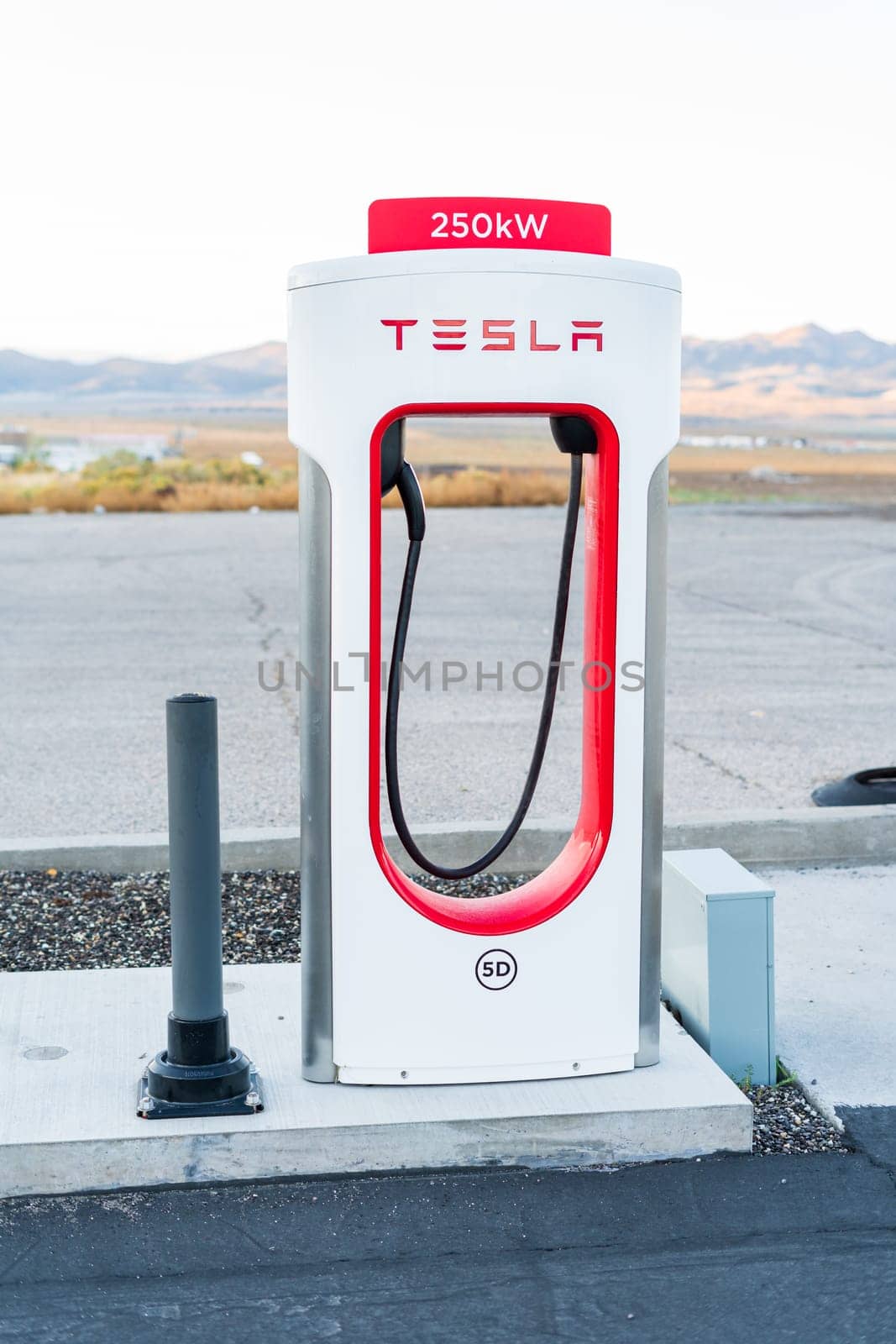 Beaver, Utah, USA-October 10, 2021 - Empty Tesla charging stations in early morning.