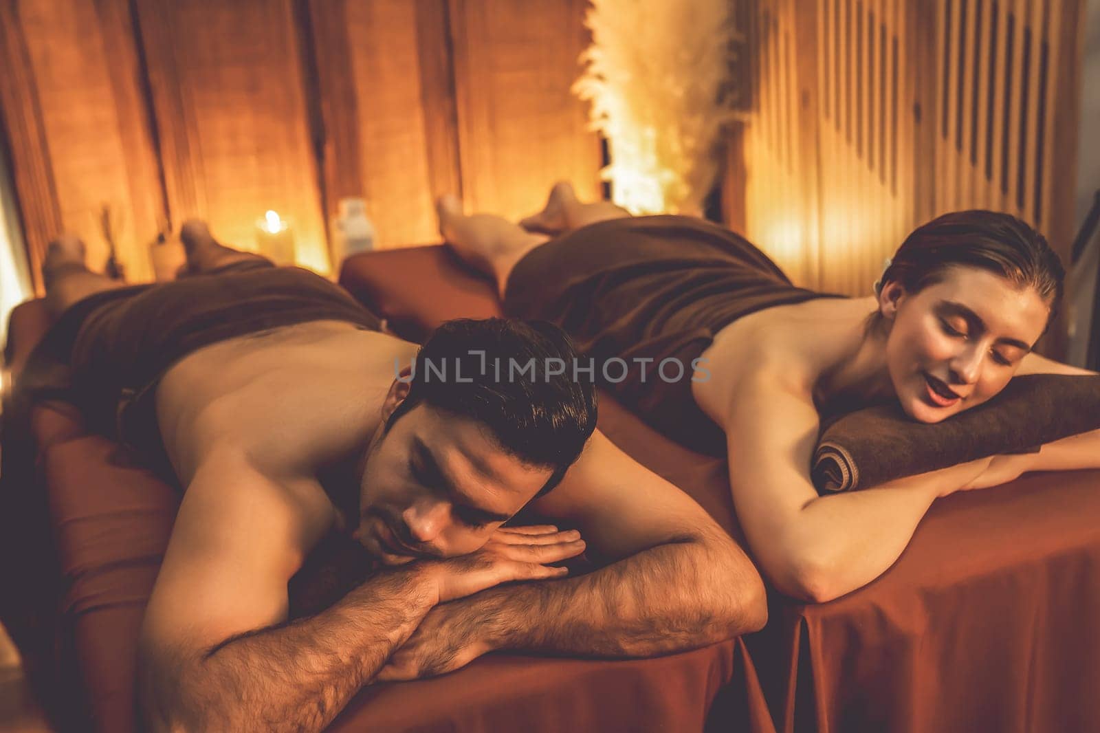 Caucasian couple customer enjoying relaxing anti-stress massage. Quiescent by biancoblue