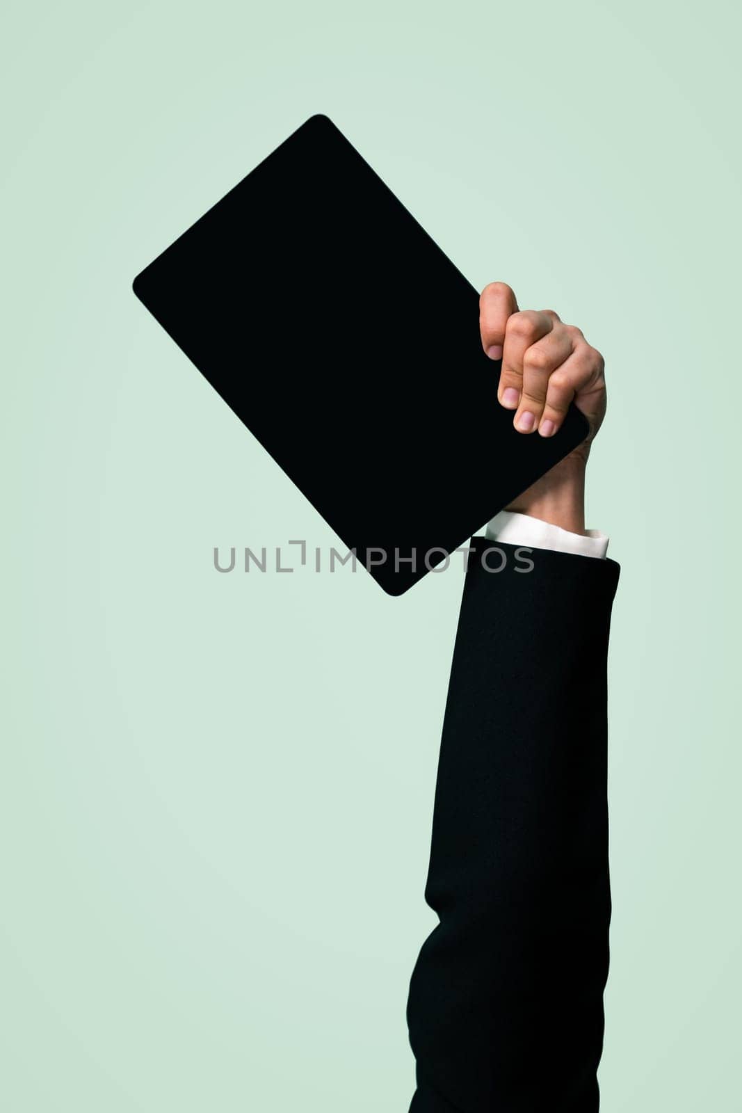 Hand holding tablet device on isolated background. Quaint by biancoblue