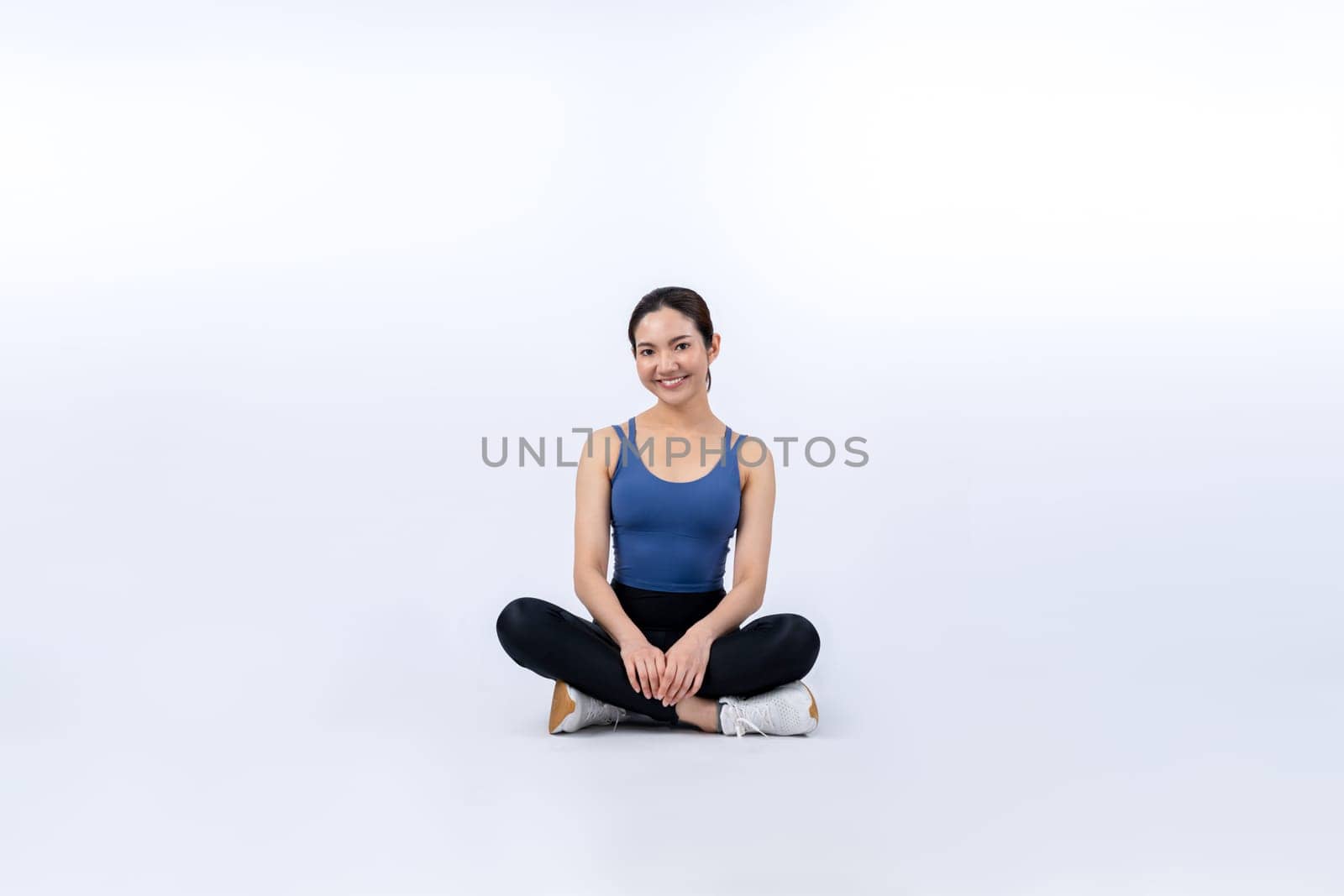 Full body asian woman in sportswear portrait, smiling and posing cheerful gesture. Workout training with attractive girl engage in her pursuit of healthy lifestyle. Isolated background Vigorous