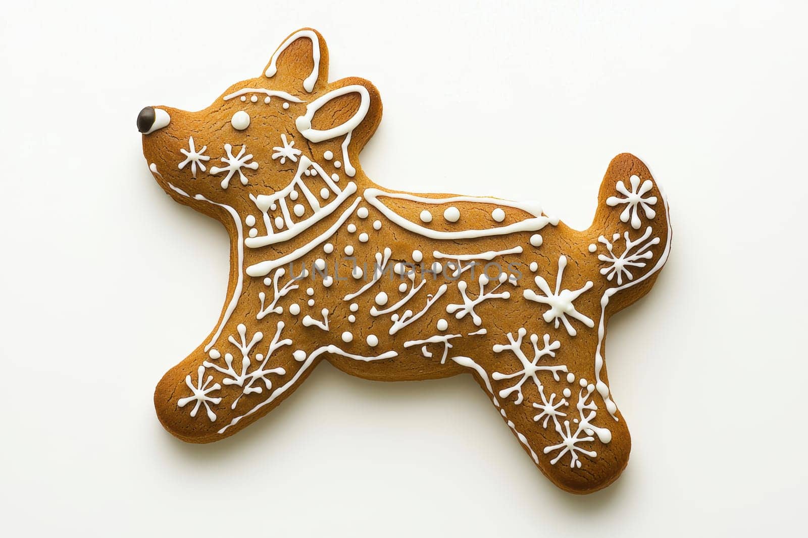 This is a delightful gingerbread cookie shaped like a cute dog, artfully decorated for the joyous festive season