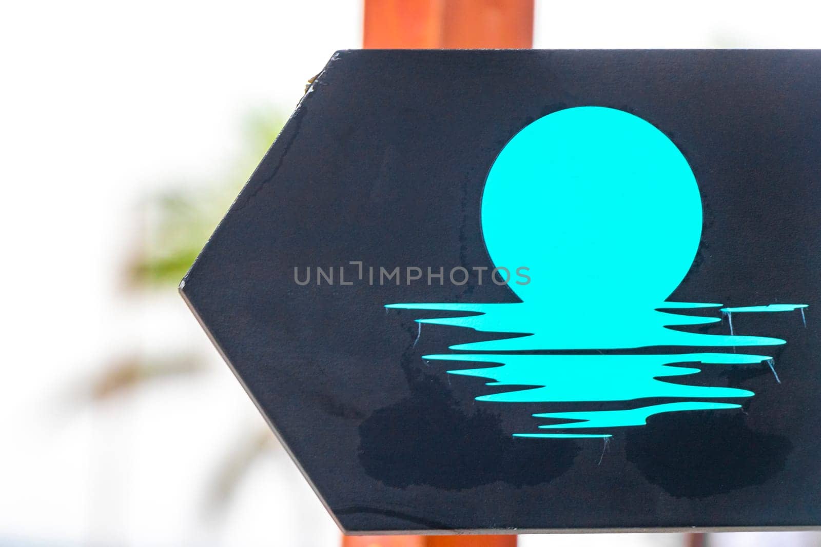 Directional signs sign on the beach in Playa del Carmen Quintana Roo Mexico.