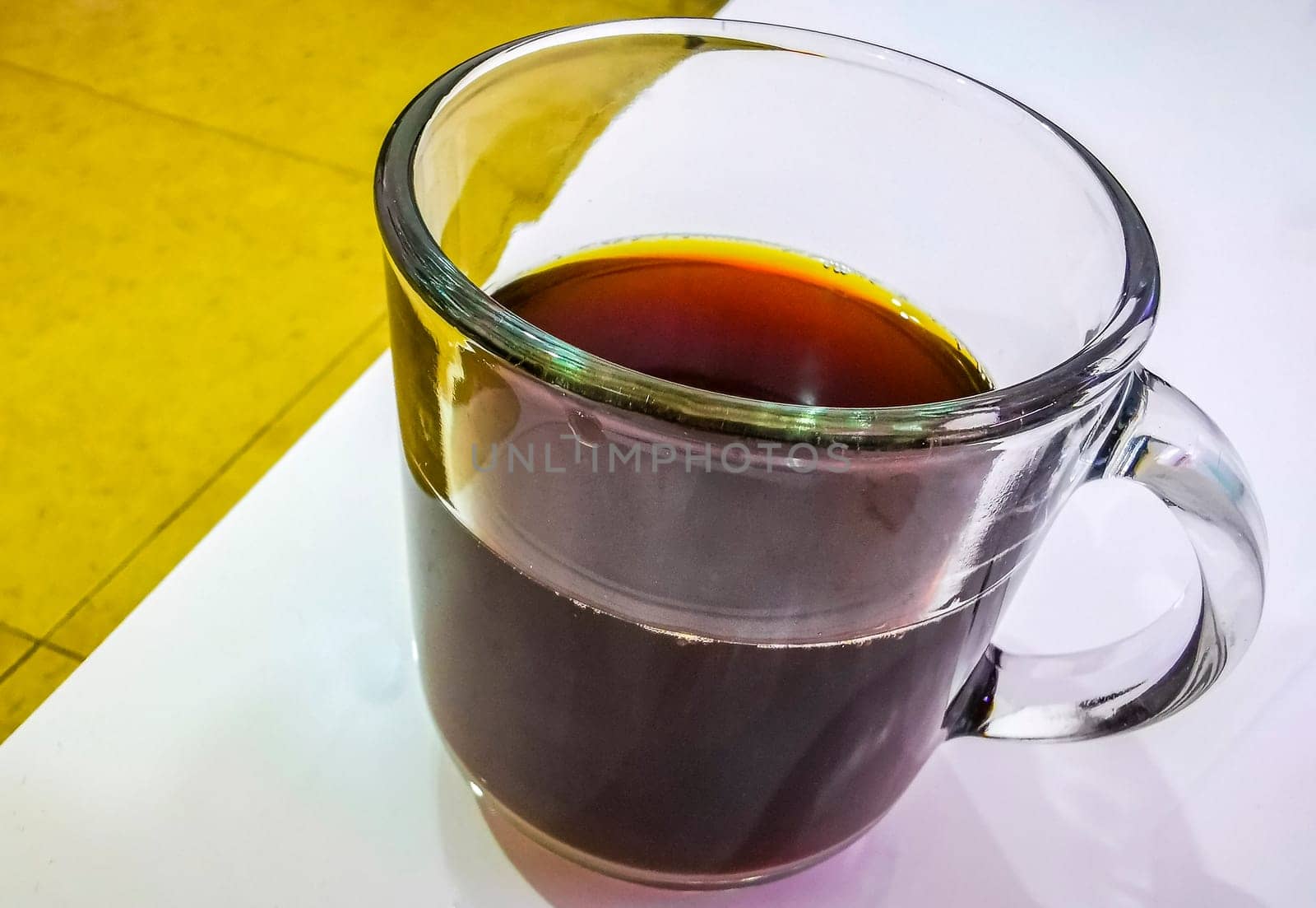 Glass with black coffee on the table in Cancun Quintana Roo Mexico.