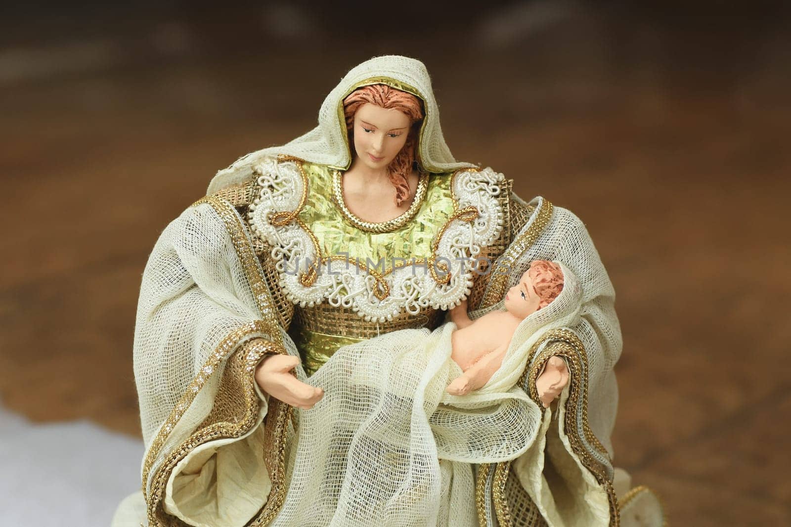 The Virgin Mary looks at the newborn Jesus Christ in cradle