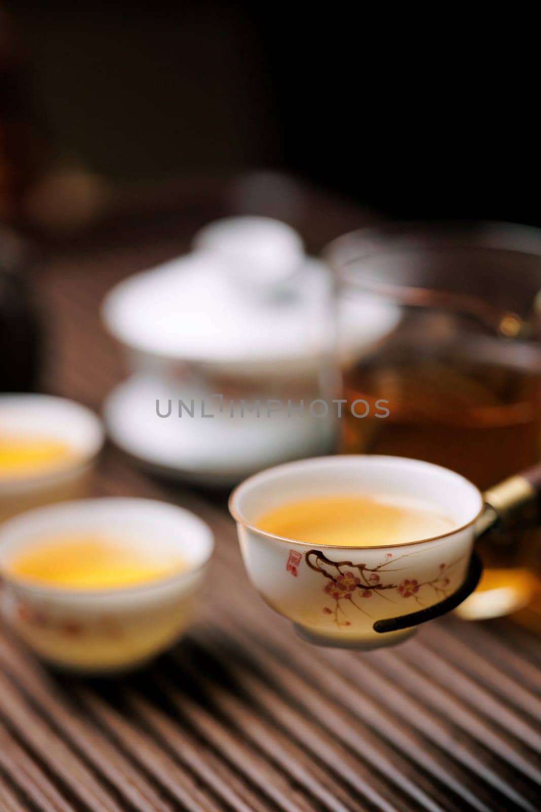 A tranquil scene with tea, elegant teacups, and a charming teapot that captures the essence of relaxation
