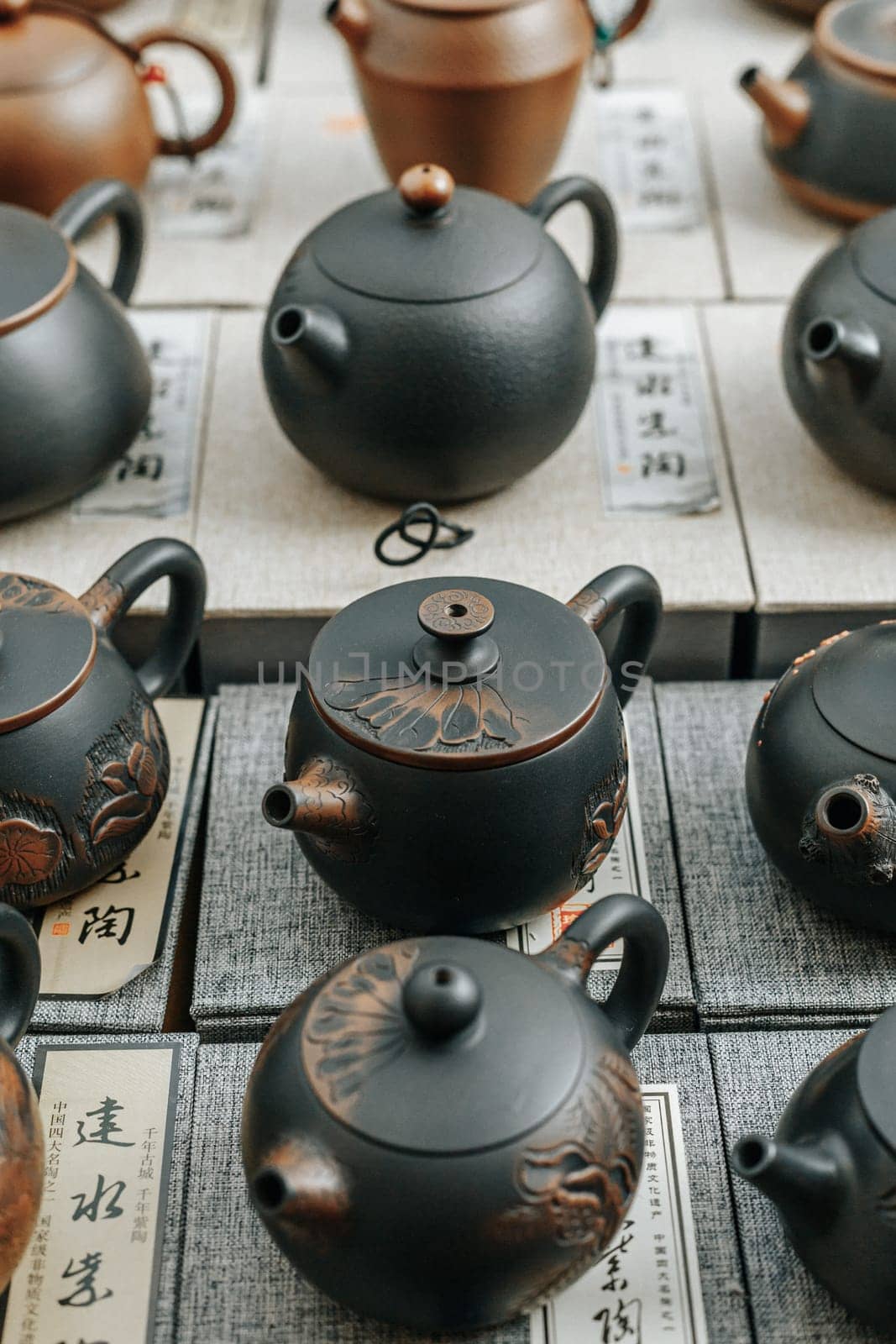 A beautifully crafted collection of traditional teapots showcasing unique designs and exceptional craftsmanship