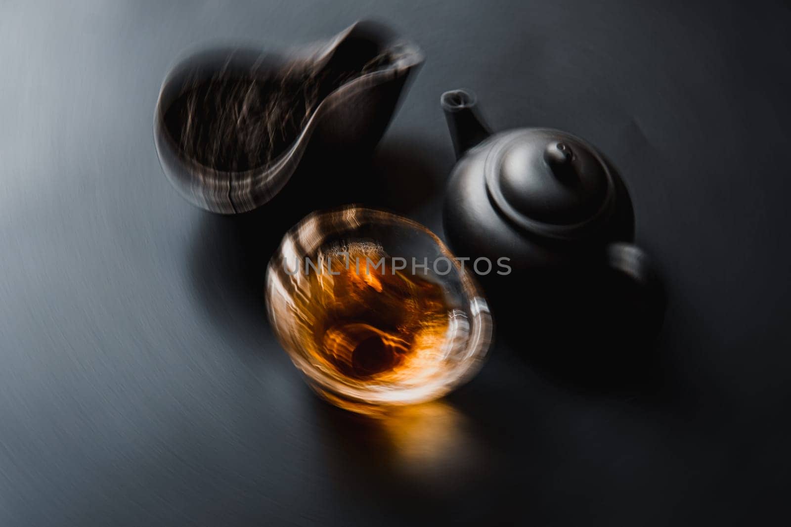A serene moment featuring brewed tea, an elegant teapot, and fresh leaves, embodying tranquility and calmness