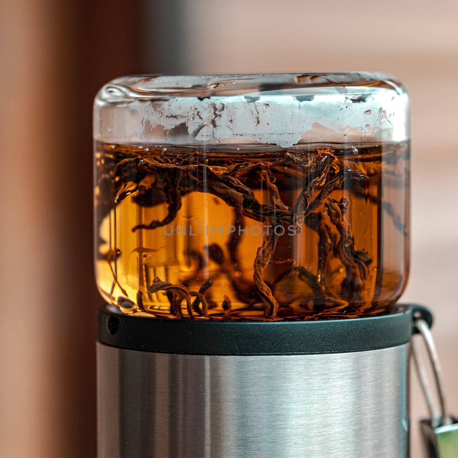 A beautifully designed stylish glass teapot that showcases the exquisite beauty of steeped loose leaf tea