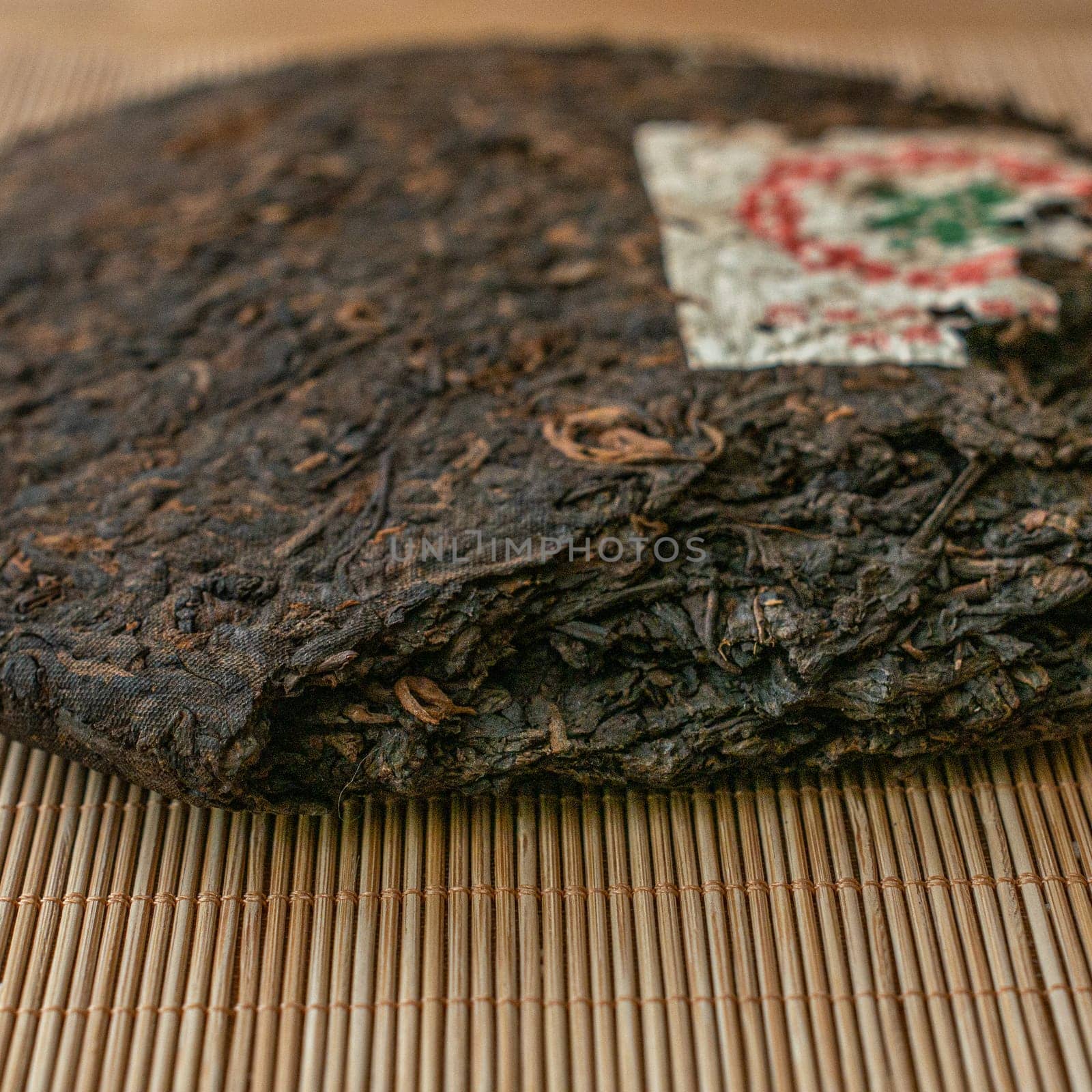 Explore this exquisite Puerh tea cake with earthy flavors and artisanal craftsmanship, ideal for tea lovers