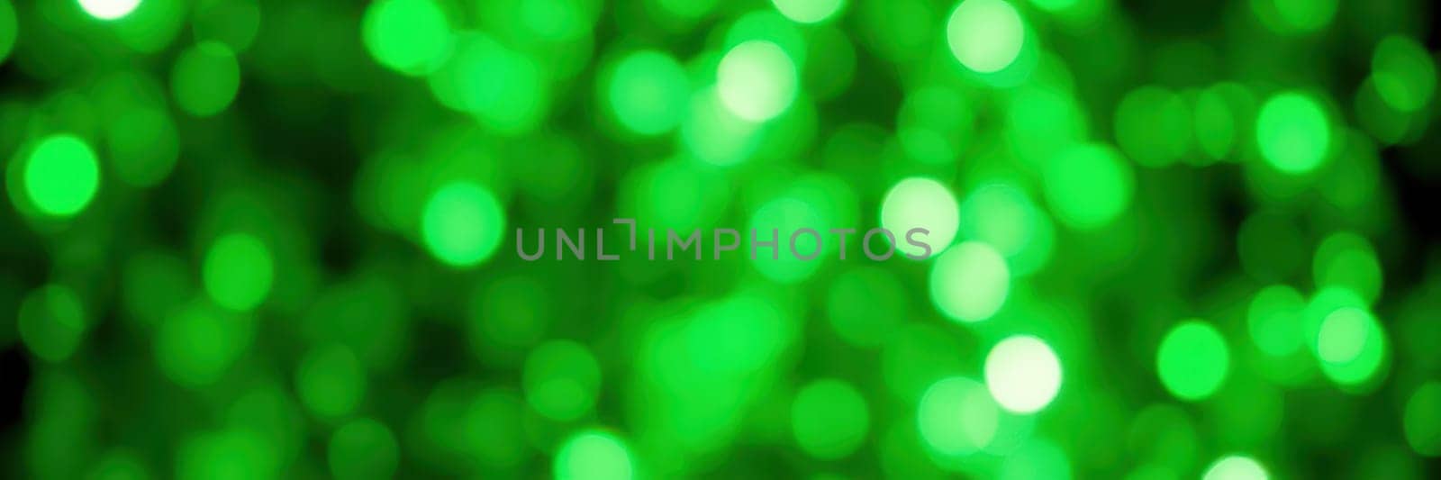Dazzling green bokeh lights fill the background, creating a lively atmosphere perfect for celebrations, parties, or special events where fun is in the air.