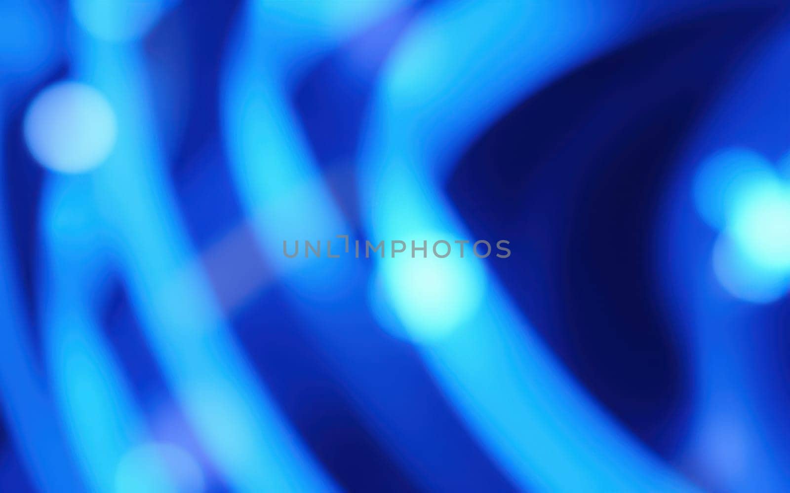 Abstract patterns of glowing blue lights create a mesmerizing effect in an urban environment at night, showcasing the lively atmosphere of the event.