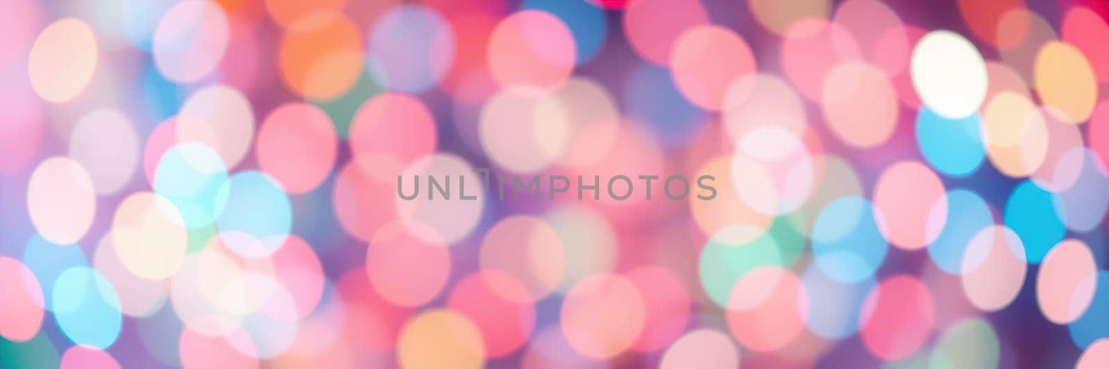 Soft, out-of-focus lights in various colors fill the background, creating a joyful and festive environment perfect for evening celebrations or gatherings.